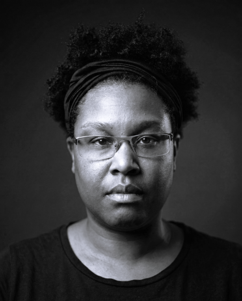 Introducing the face behind the world building Shane Ann Connell - serious portrait picture